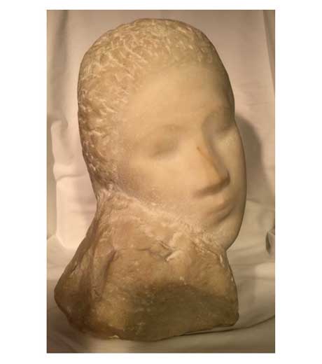 Bust of a girl in marble by Jussuf Abbo