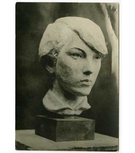 Head of a girl in stone by Jussuf Abbo