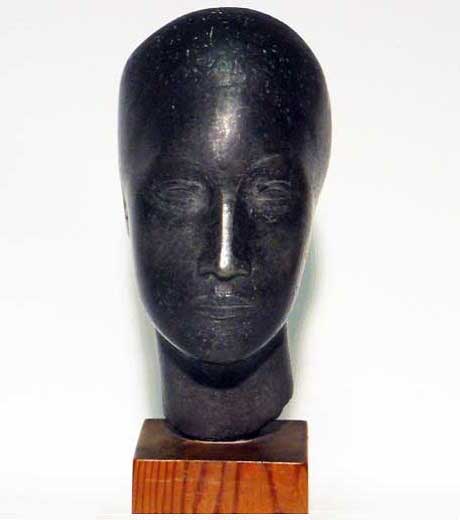 Woman’s head in pewter by Jussuf Abbo