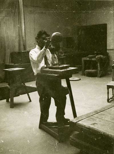 Jussuf Abbo, working on a sculpture.